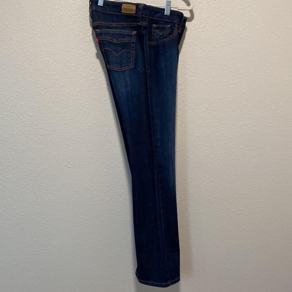 Levi’s women’s Low Boot Cut 545 Jeans. Size 2. Dark blue in color.